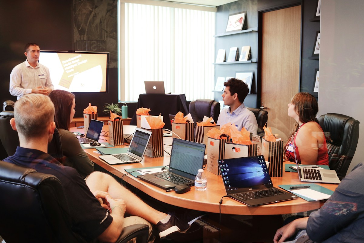 Brand strategy workshop with stakeholders discussing a shared business direction
